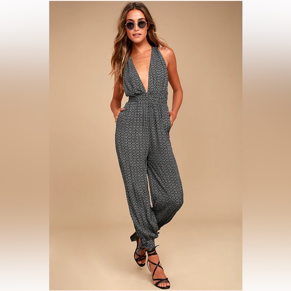 Lulus Take a Trip Black Print Halter Jumpsuit Plunging Neckline Tied Back